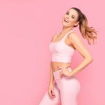 Smiling girl enjoying fitness training.